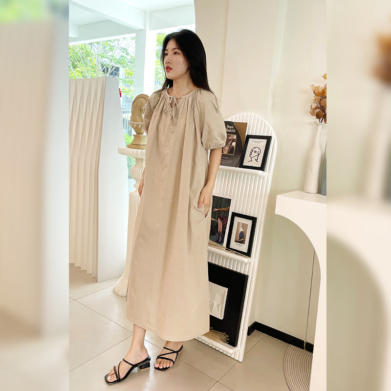 New fresh temperament dress loose bubble sleeves cover meat round neck pleated gentle pure cotton design doll skirt