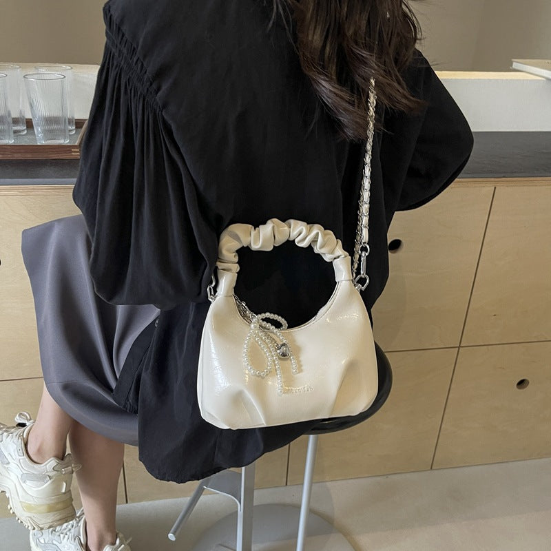 SIXSR 2025 Hand carry pleated dumpling bag women's Korean version ins simple fashion versatile shoulder bag popular niche design messenger bag