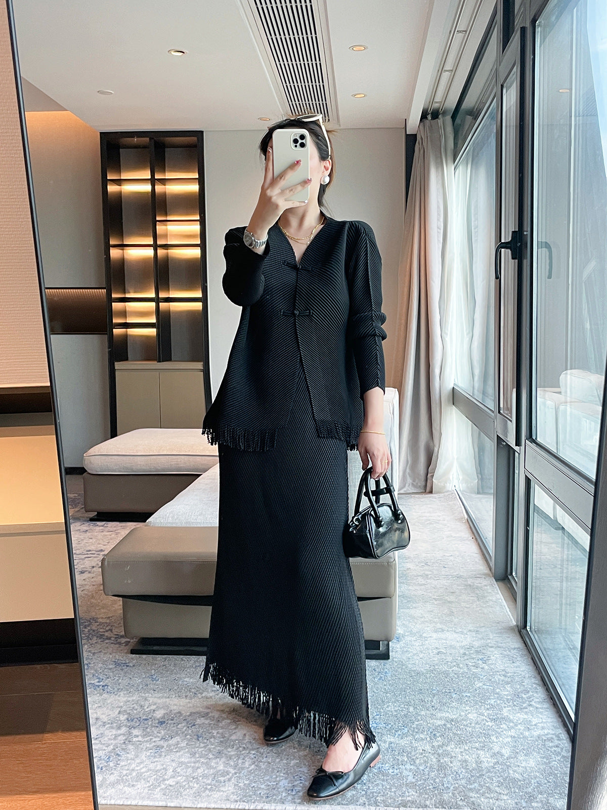 Miyake's new dragon scale pleated fashion suit women's high-end temperament slim top fringed design skirt two-piece set