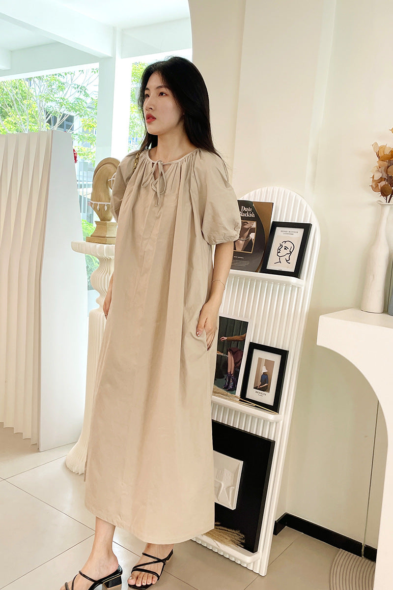 New fresh temperament dress loose bubble sleeves cover meat round neck pleated gentle pure cotton design doll skirt