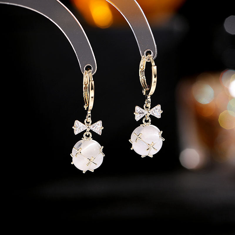 2025 Simple and versatile earrings women's Dongdaemun new earrings bow zircon ear buckle three-dimensional small ball opal earrings