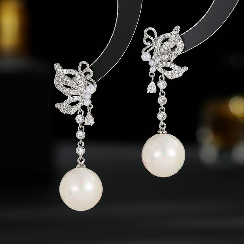 2025 S925 silver needle retro elegant temperament earrings women's light luxury high-end long butterfly pearl fringed earrings