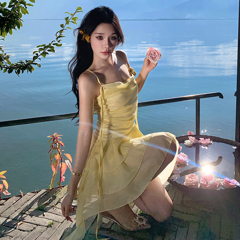 2025 Seaside vacation ruffle leaf suspender dress women's 2025 summer new design sense niche three-dimensional flower skirt