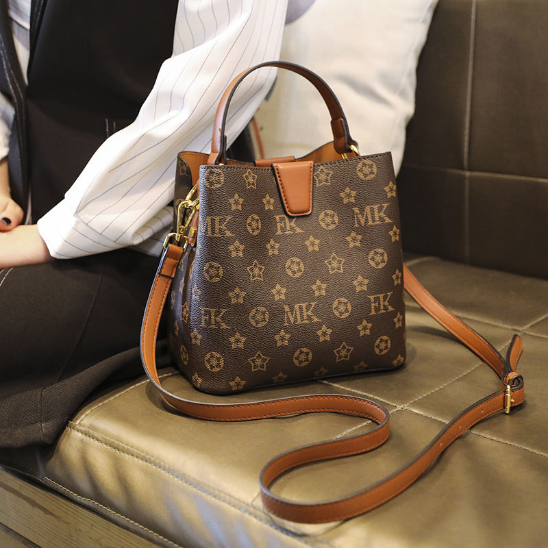 2025 Douyin Kuaishou live stream supply, light luxury brand bags, high-end printed old flower bucket bags, fashionable and versatile