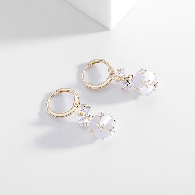 2025 Simple and versatile earrings women's Dongdaemun new earrings bow zircon ear buckle three-dimensional small ball opal earrings