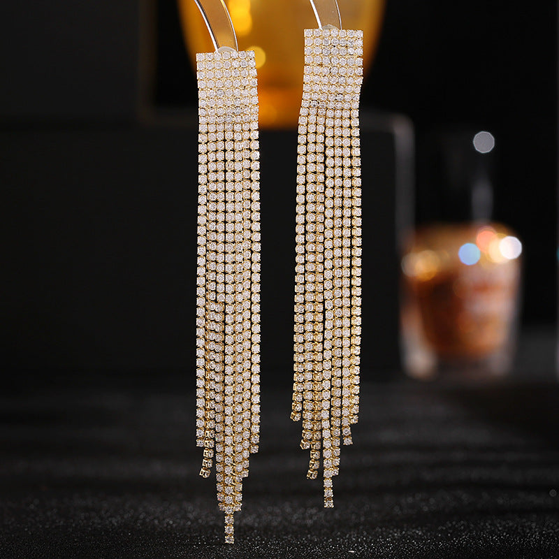 2025 Light luxury style long modified face celebrity temperament earrings tide annual meeting dress with zircon claw chain fringed earrings