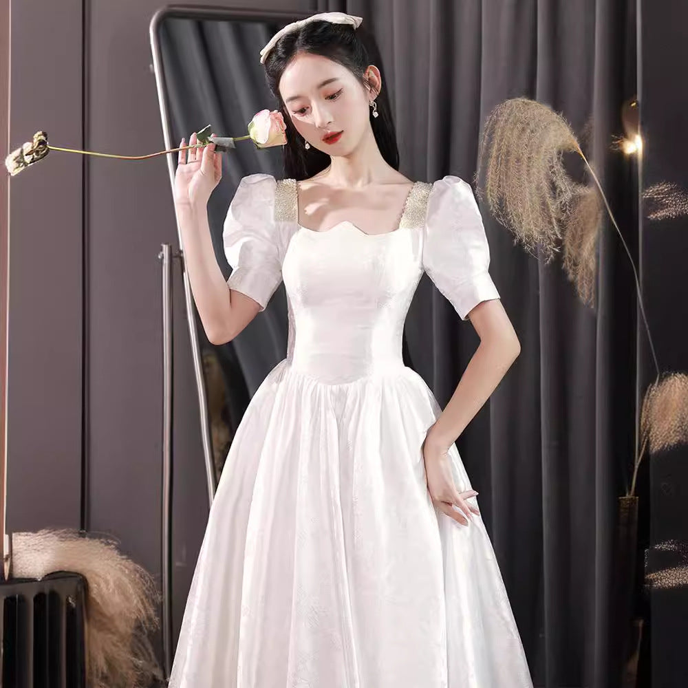 Spring small evening dress new white temperament simple and generous light wedding dress engagement women manufacturers wholesale