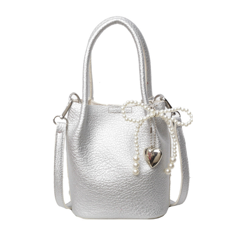SIXSR 2025 Hand strap bucket bag women's Korean version ins fashion temperament pearl shoulder bag popular niche trend shoulder bag