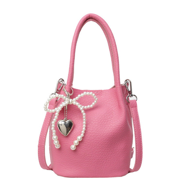 SIXSR 2025 Hand strap bucket bag women's Korean version ins fashion temperament pearl shoulder bag popular niche trend shoulder bag