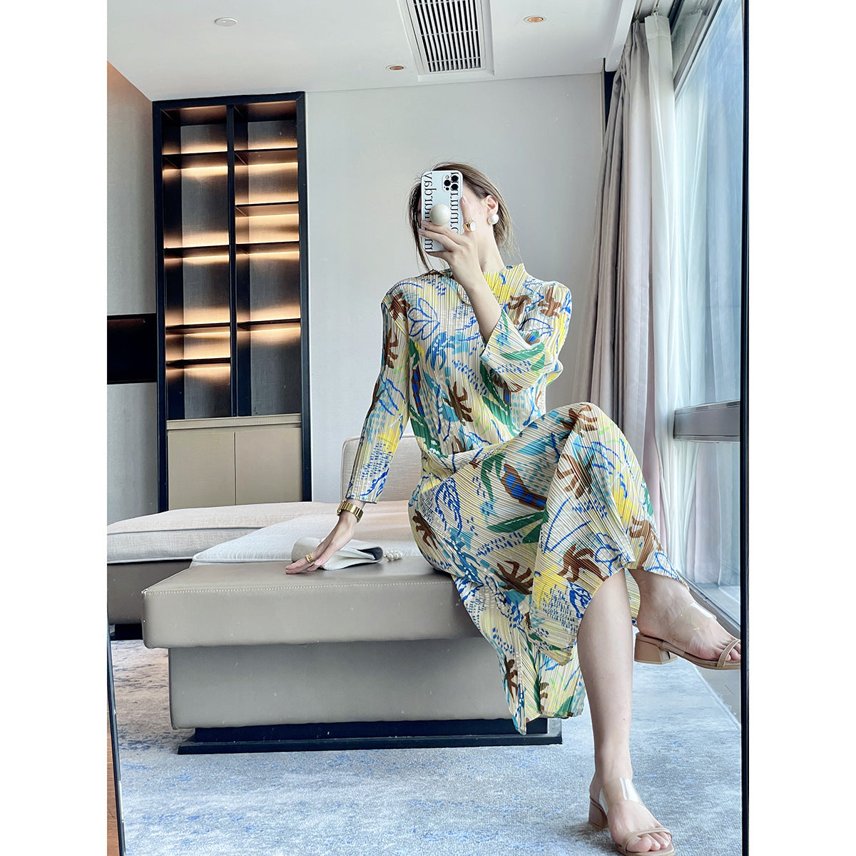 Folds autumn new jungle printing design sense Miyake dress temperament elegant, covering meat and showing thin skirt