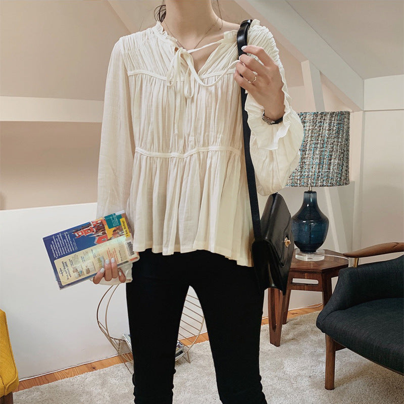 Chiffon V-neck shirt top women's spring new, pleated splicing design Korean version leopard long-sleeved shirt