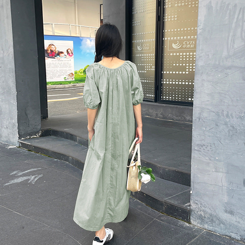 New fresh temperament dress loose bubble sleeves cover meat round neck pleated gentle pure cotton design doll skirt