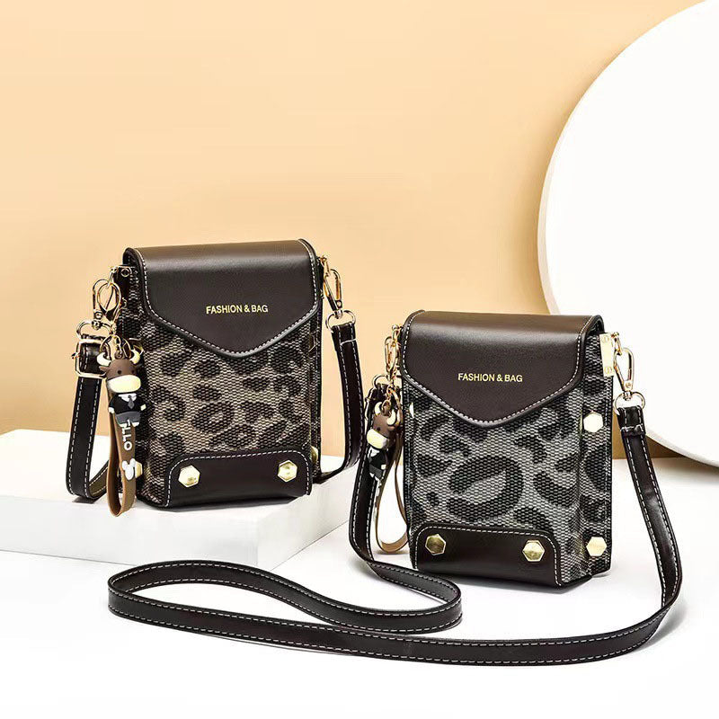 SIXSR 2025Mr. Pufferfish summer new popular messenger mobile phone bag letter vertical single shoulder Popular style small satchel women's bag