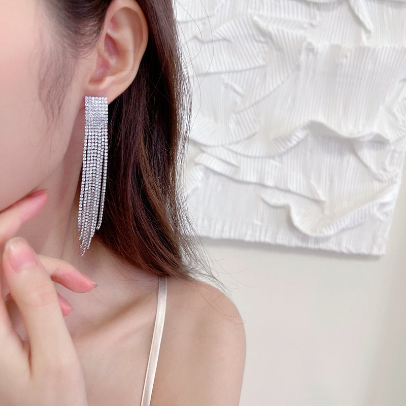 2025 Light luxury style long modified face celebrity temperament earrings tide annual meeting dress with zircon claw chain fringed earrings