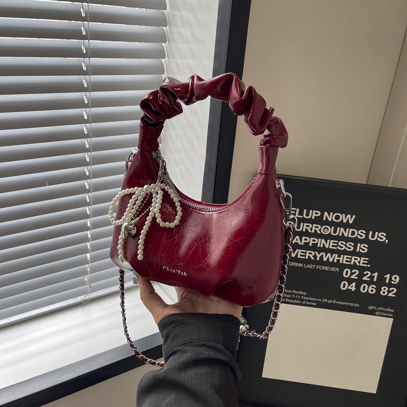 SIXSR 2025 Hand carry pleated dumpling bag women's Korean version ins simple fashion versatile shoulder bag popular niche design messenger bag