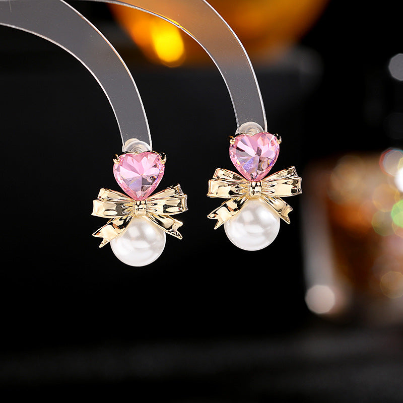 2025 Simple and versatile temperament sweet girl heart earrings s925 silver needle earrings trendy love pearl bow earrings