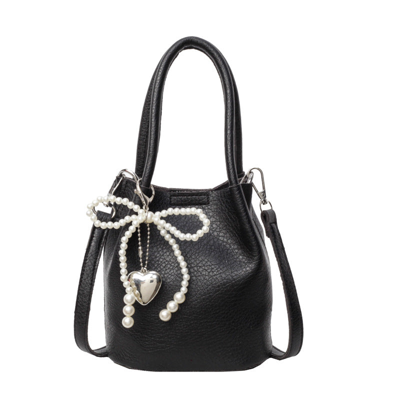 SIXSR 2025 Hand strap bucket bag women's Korean version ins fashion temperament pearl shoulder bag popular niche trend shoulder bag
