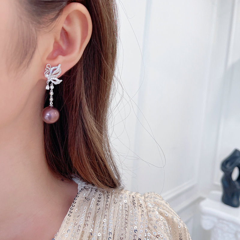 2025 S925 silver needle retro elegant temperament earrings women's light luxury high-end long butterfly pearl fringed earrings