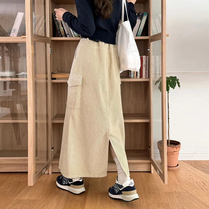 Retro corduroy skirt women's spring new pocket design solid color tooling skirt back split long skirt