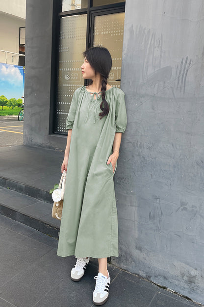 New fresh temperament dress loose bubble sleeves cover meat round neck pleated gentle pure cotton design doll skirt