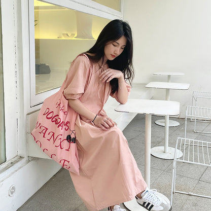 New fresh temperament dress loose bubble sleeves cover meat round neck pleated gentle pure cotton design doll skirt