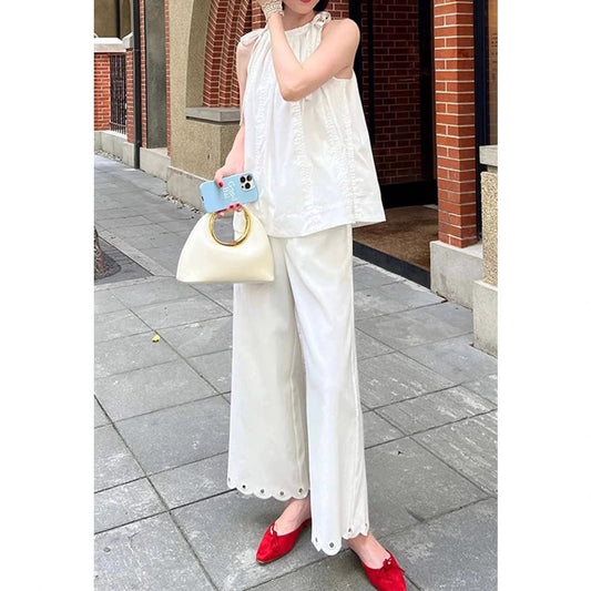 Siyuan light luxury embroidery hollow punched lace linen cotton slightly wide-leg pants women's comfortable temperament nine-point pants 7854