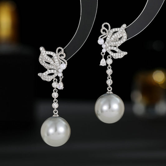 2025 S925 silver needle  retro elegant temperament earrings women's light luxury high-end long butterfly pearl fringed earrings